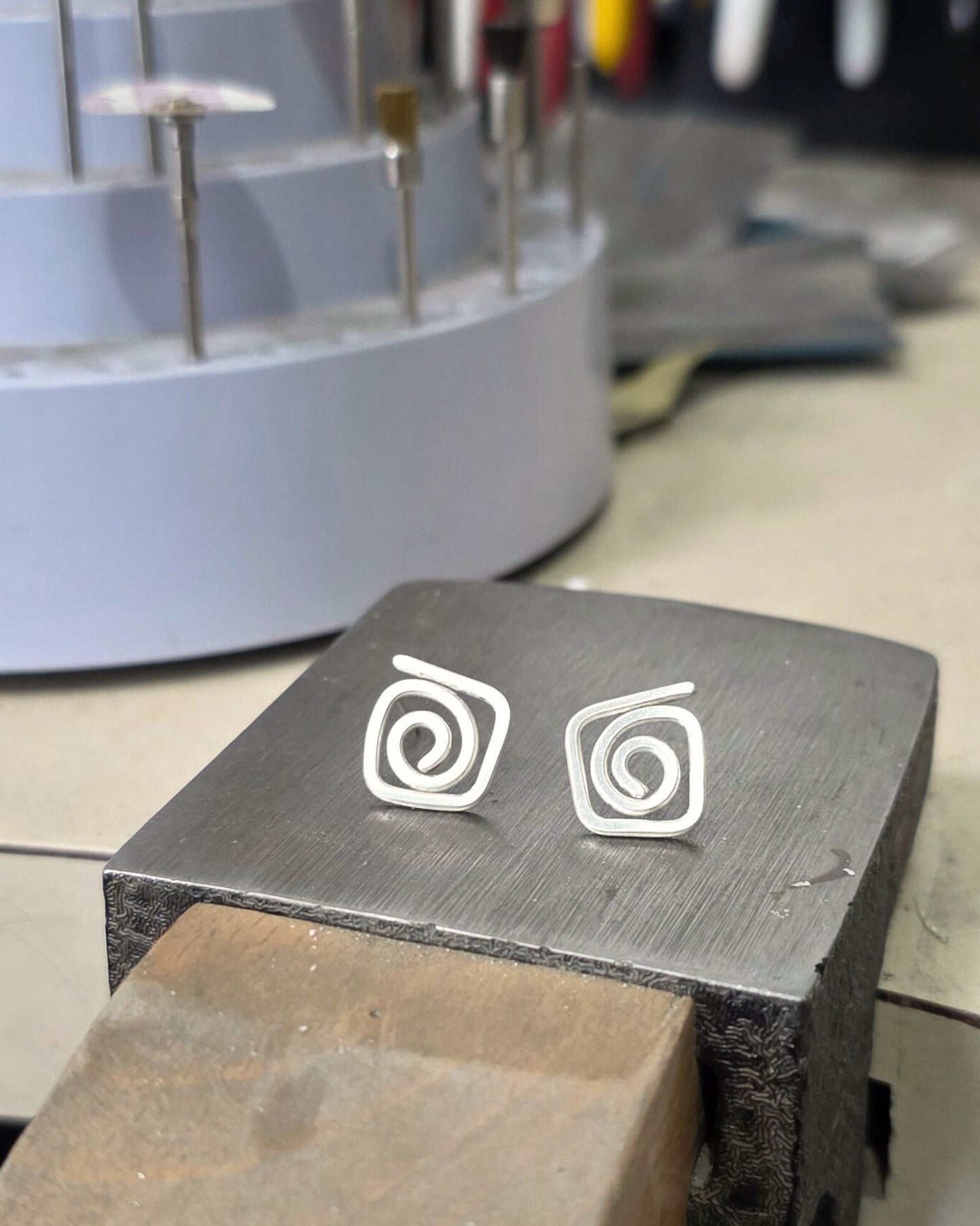 artisan sterling silver diamond swirl stud earrings in aurelium jewellery studio
