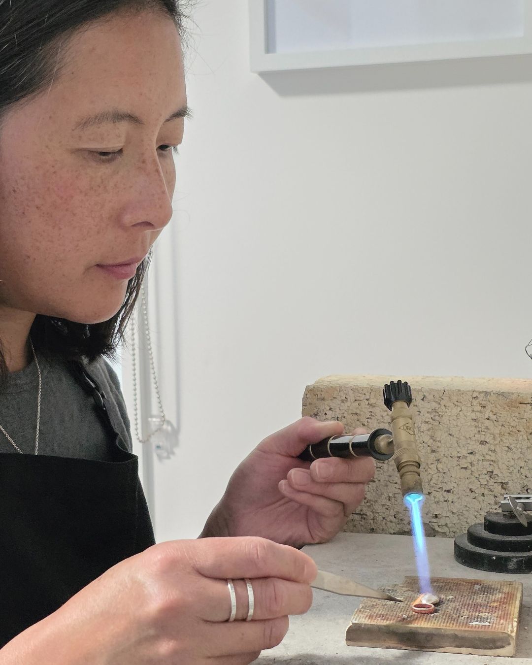 behind-the-scenes-soldering-ring-in-aurelium-jewellery-studio