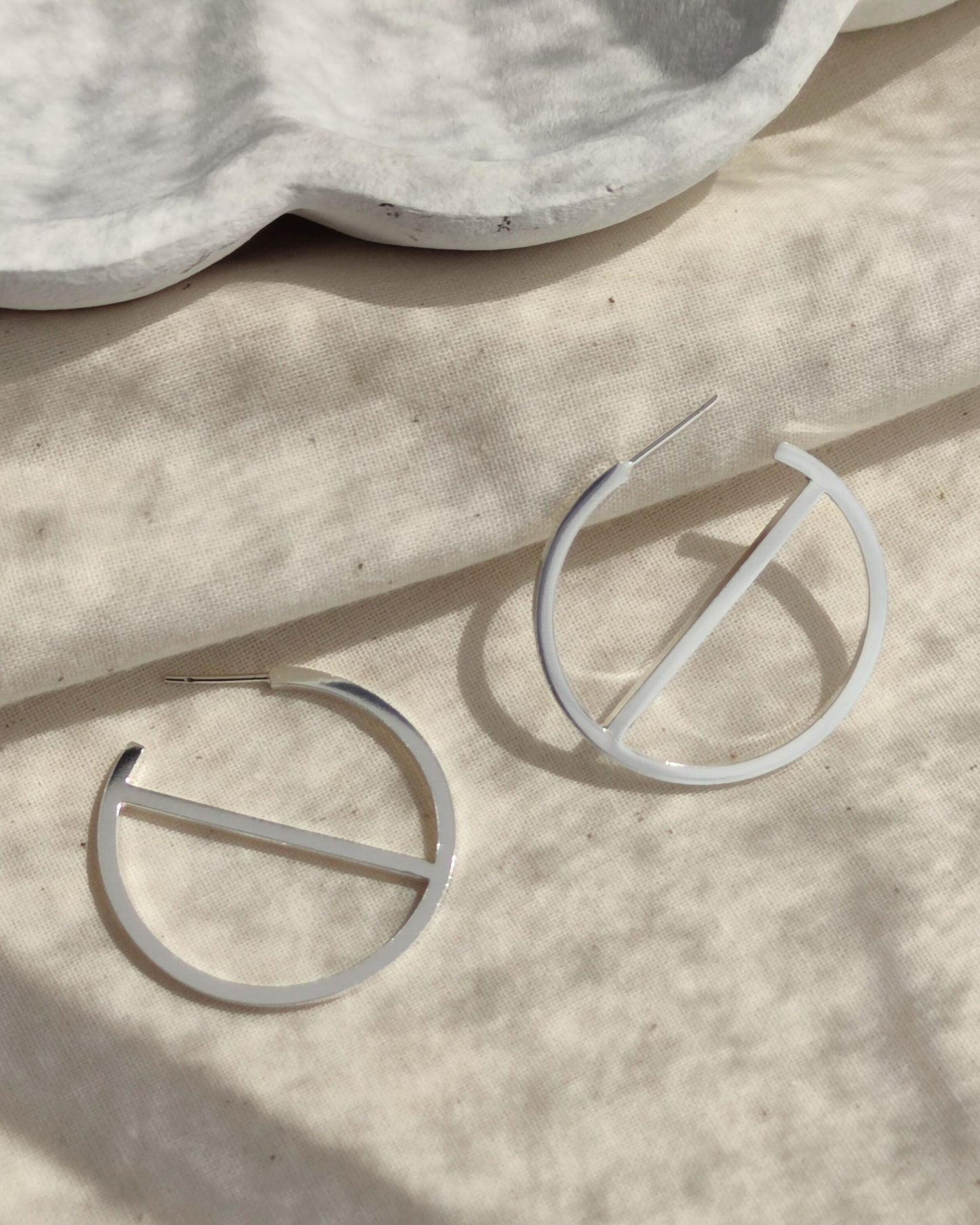 bold sterling silver slice hoop earrings by aurelium nz