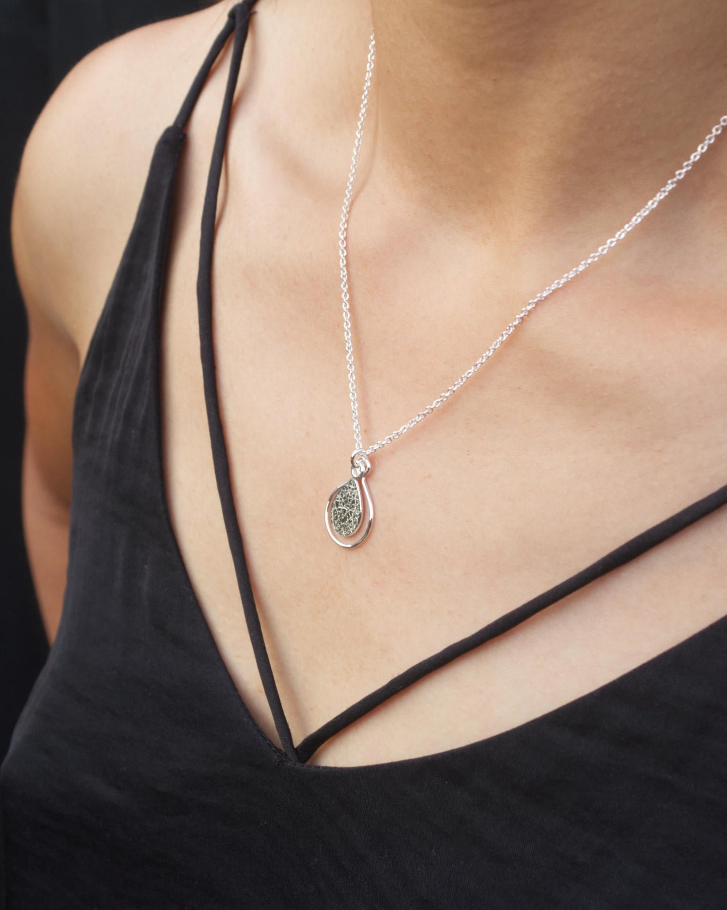 model wearing handmade sterling silver textured dewdrop necklace