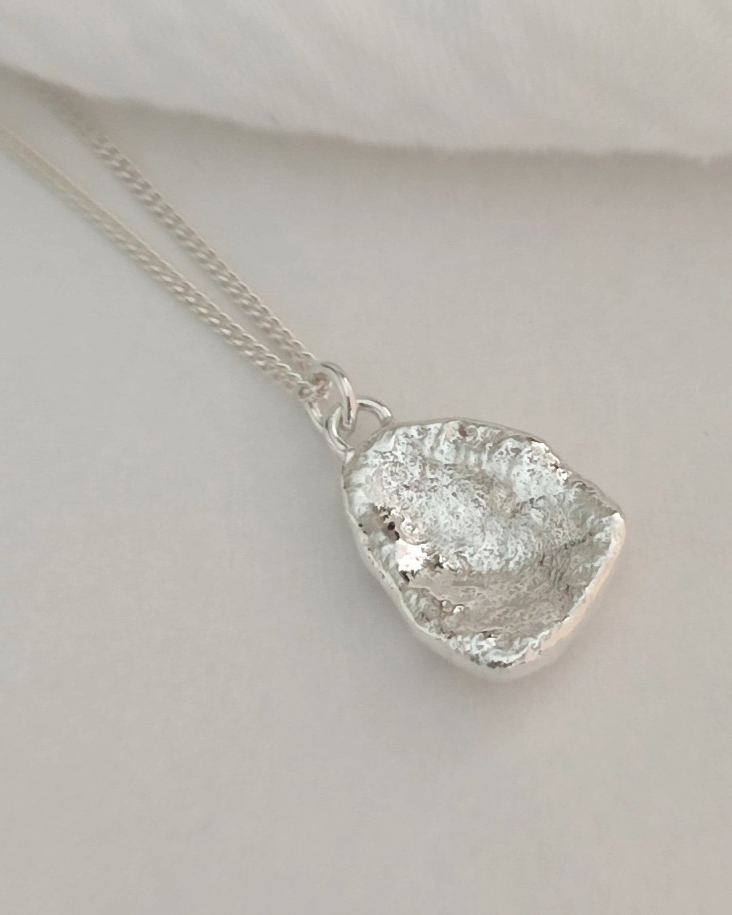 organic textured sterling silver pendant handmade in christchurch nz