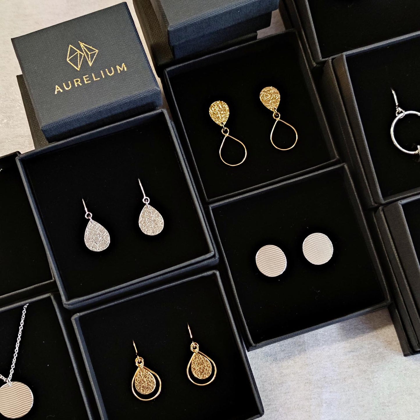 aurelium gold and silver jewellery in black gift boxes