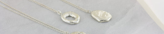 handmade silver freeform molten necklaces by aurelium nz