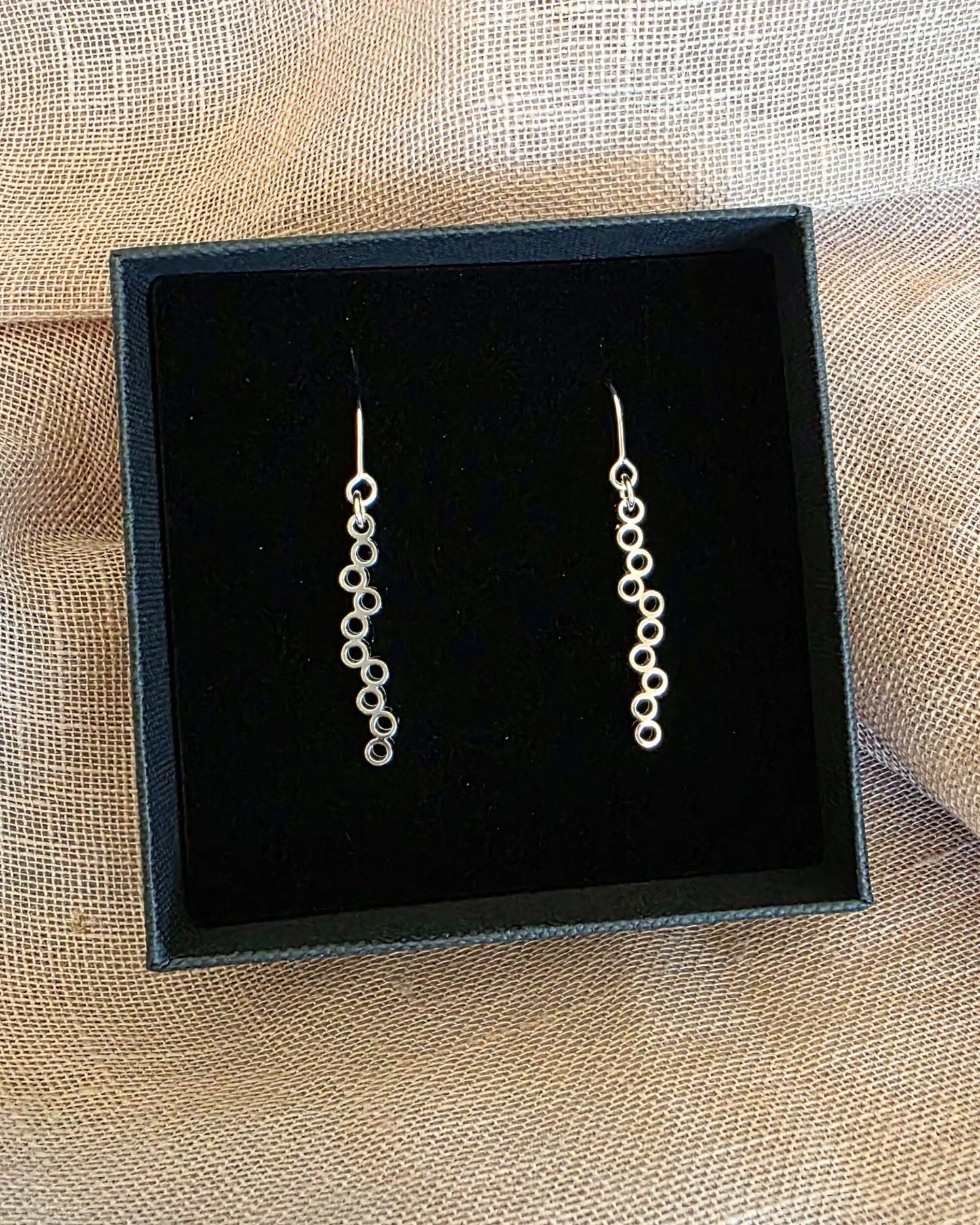 artisan sterling silver circle pipeline earrings in aurelium jewellery box