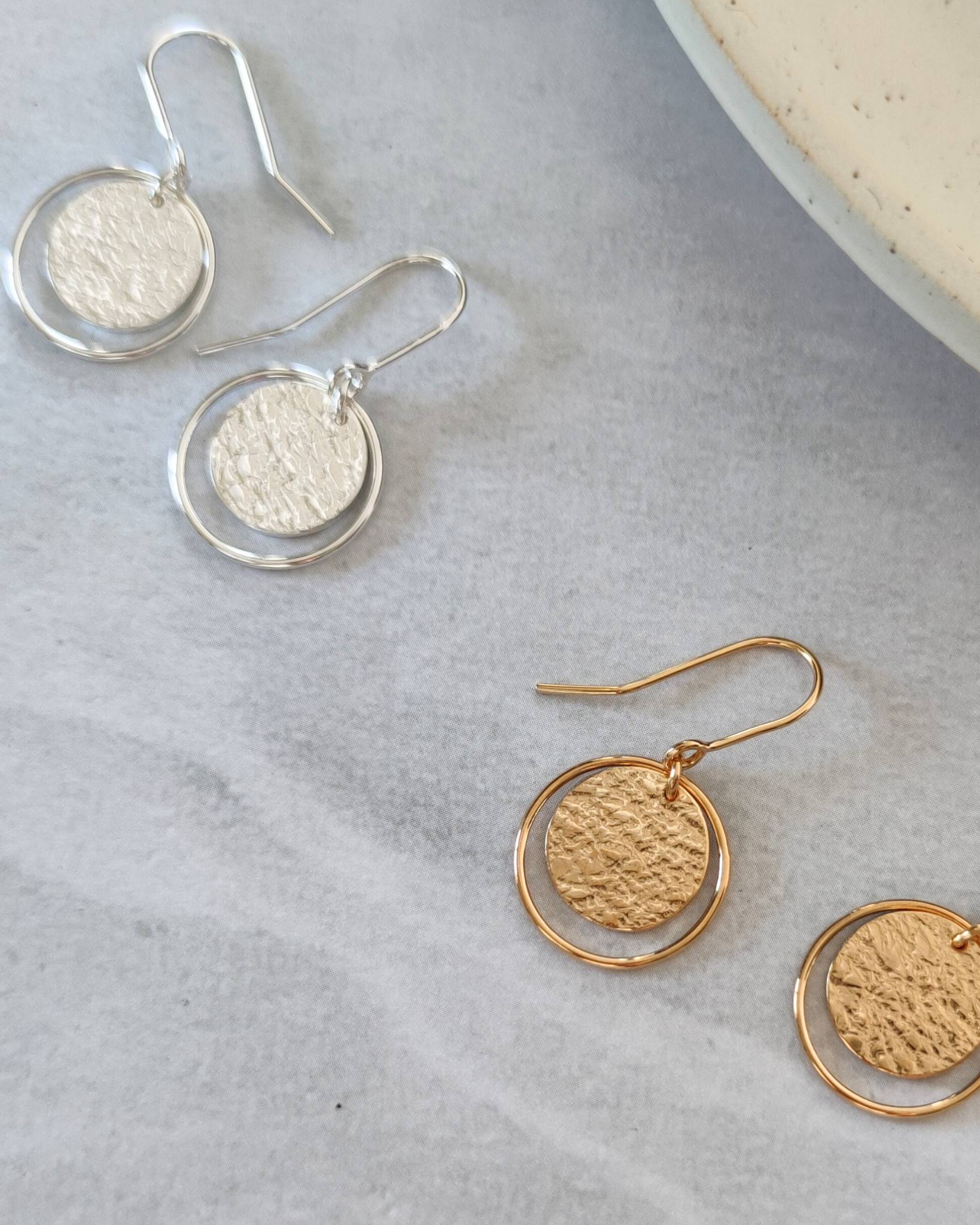 handmade textured gold and silver roundabout circle earrings by aurelium nz