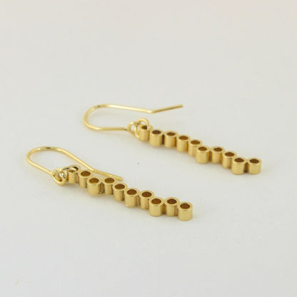 minimalist gold geometric tube dangly earrings on hooks