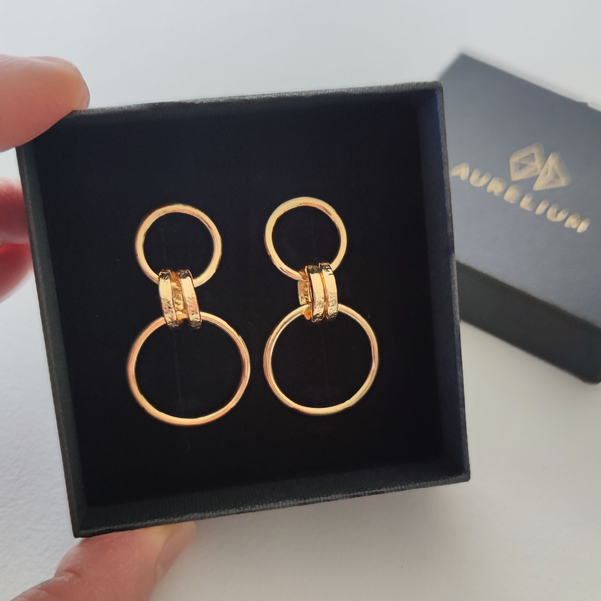 handmade minimalist gold link earrings in black aurelium gift box