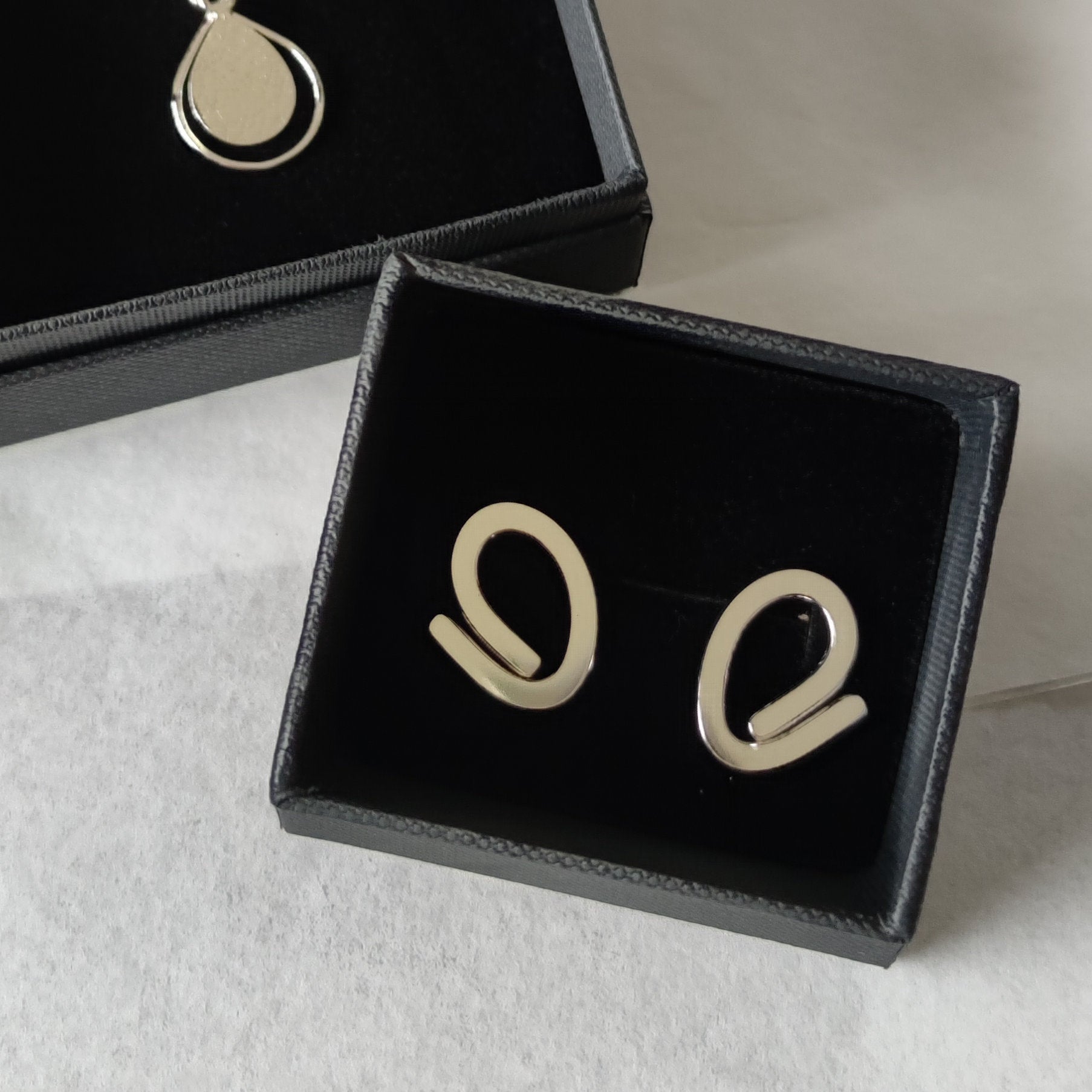 handmade sterling silver loop stud earrings in black gift box