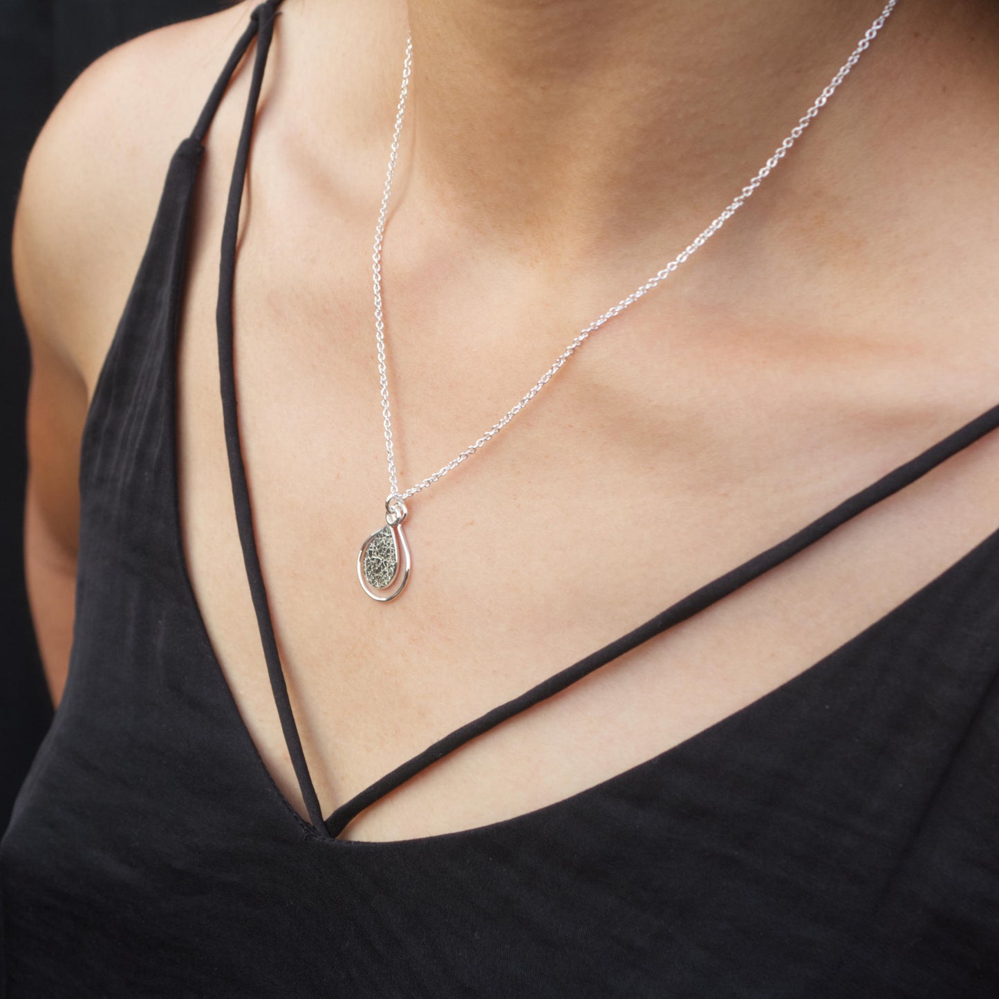 model wearing handmade sterling silver textured dewdrop necklace