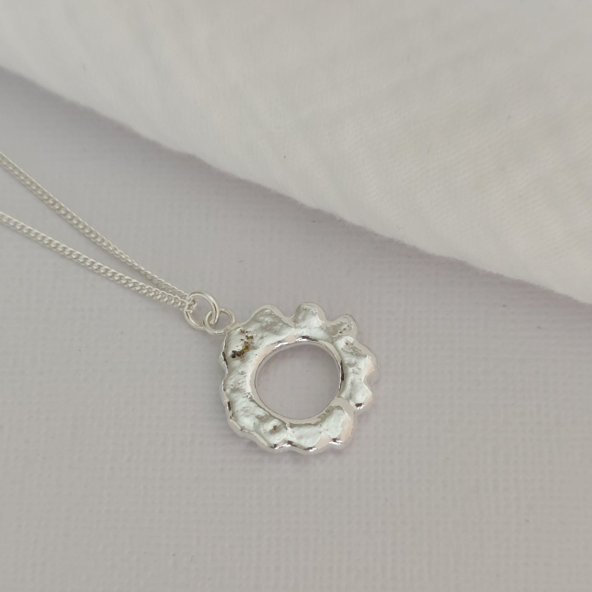 elegant polished organic molten necklace in sterling silver