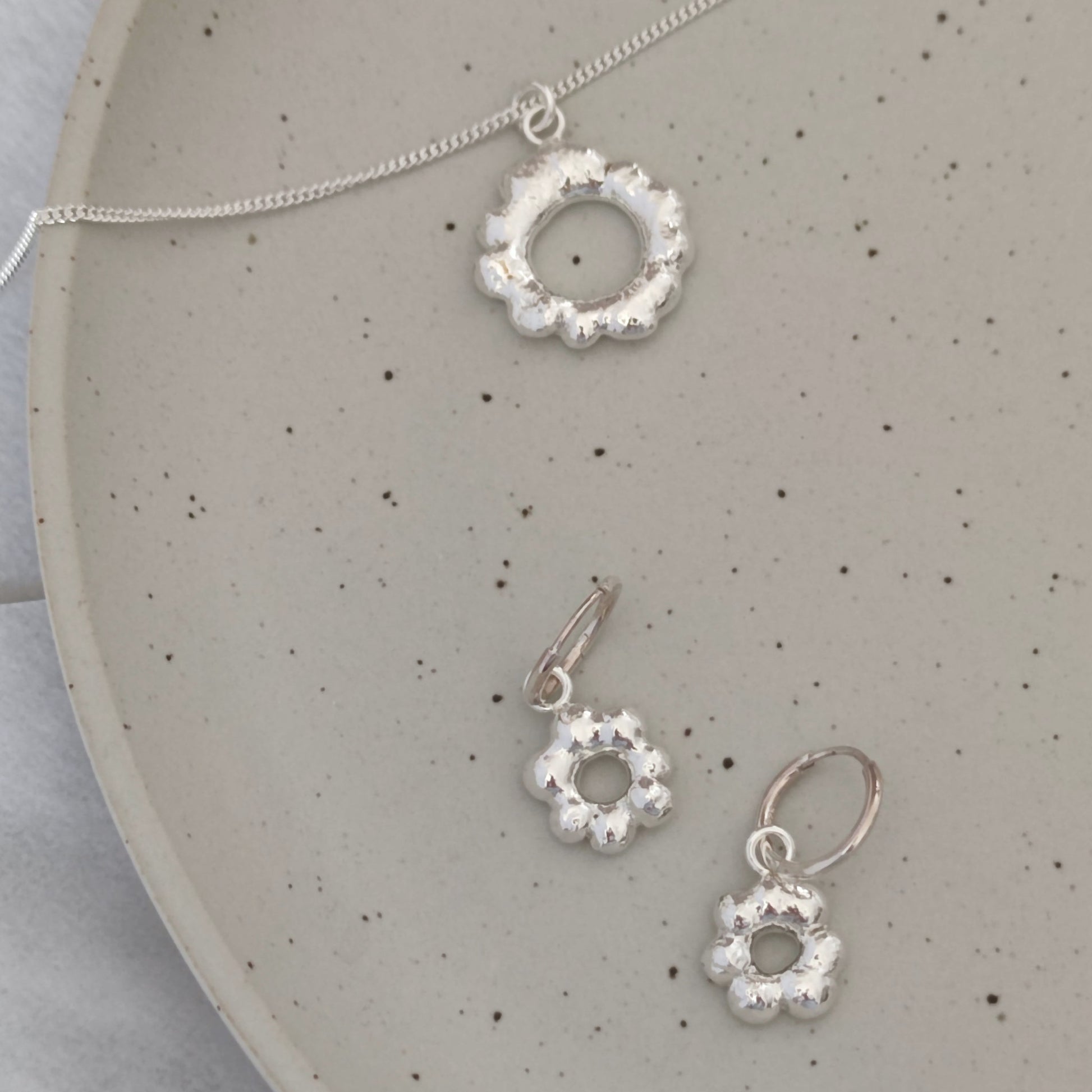 handmade sterling silver molten loop pendant and flower earrings