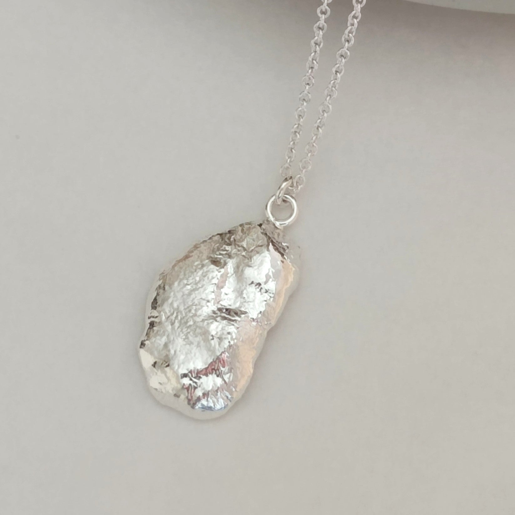 chunky polished sterling silver molten pendant by aurelium