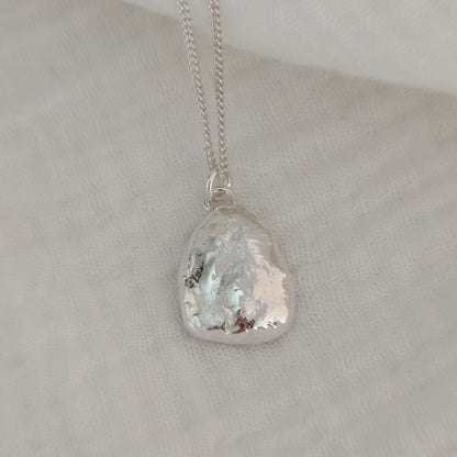 organic polished sterling silver necklace with textured surface