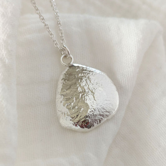 chunky molten pendant handmade from recycled sterling silver