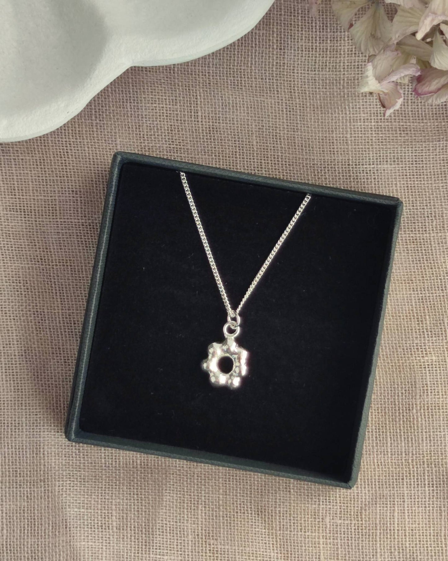 delicate molten silver flower pendant in aurelium jewellery gift box