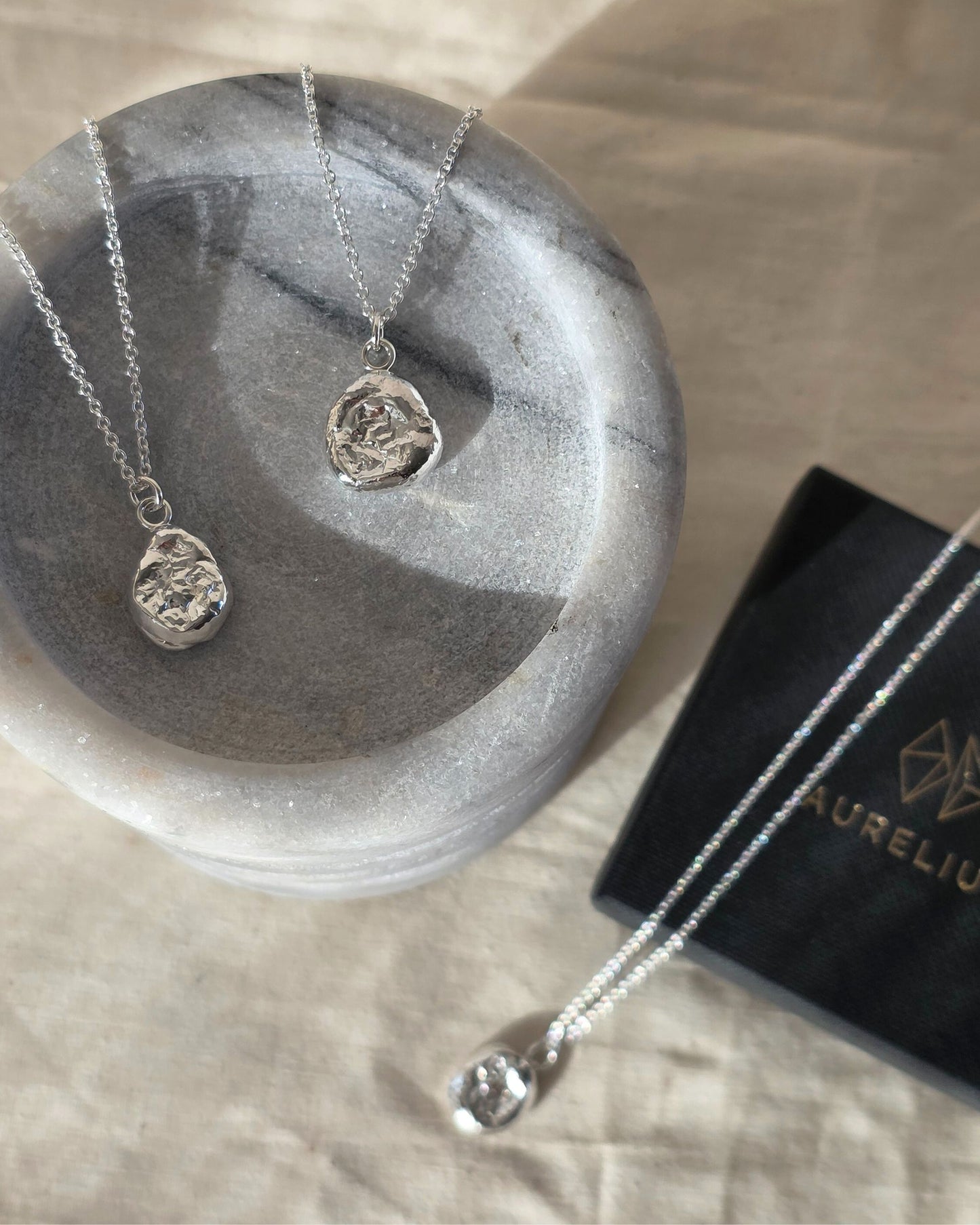 Molten Imprint Swirl Pendant | Silver