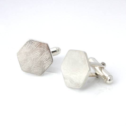 minimalist and handmade sterling silver scribbles cufflinks on white background
