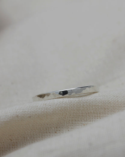 delicate handmade silver stacking ring with hammered texture