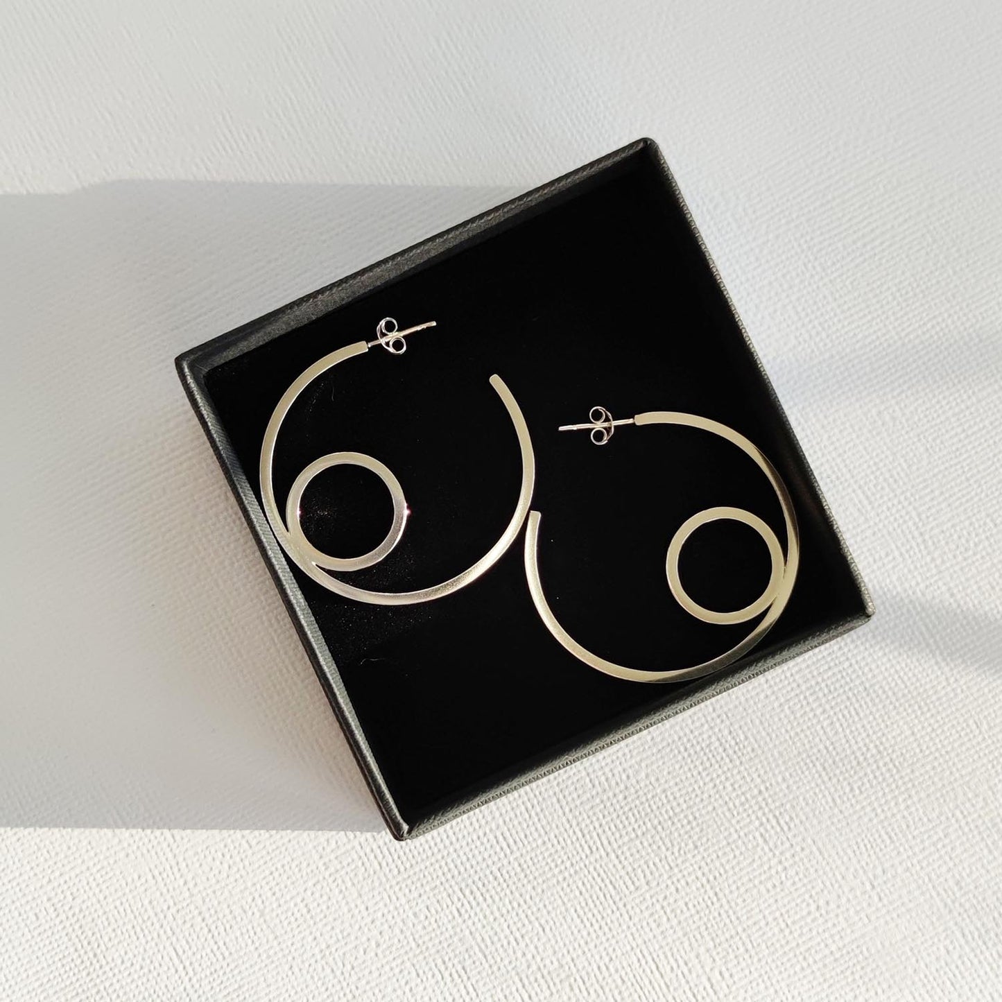 sterling silver double circle hoop earrings in aurelium black gift box